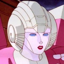 Arcee is a female Transformer colored pink and white