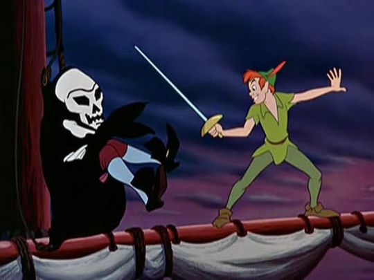 8 - The pirates are chased away and Captain Pan sailing the ship back to London
