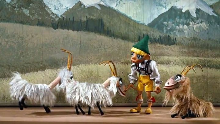High on a hill was a lonely goatherd